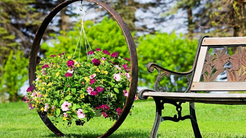 Transform a wagon wheel Into A Flower Pot Holder